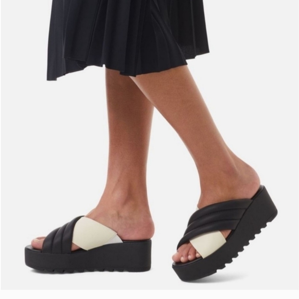 Sorel Black and Cream Platform Shoes with Chunky Sole.
